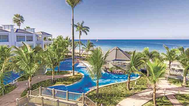 Beautiful view of the infinity pool at azul beach resort negril jamaica