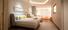 luxurious twin beds in Nickelodeon Hotels and Resorts suite in Riviera Maya 