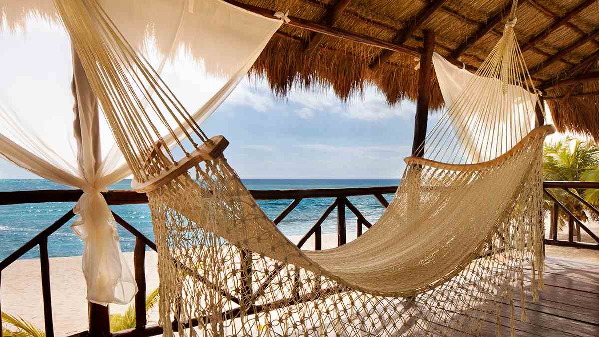 Relaxing hammock resting at oceanfront resort | El Dorado Casitas Royale | Riviera Maya