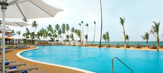 Poolside with beachfront view at punta cana luxury resort | sensatori resort | mexico